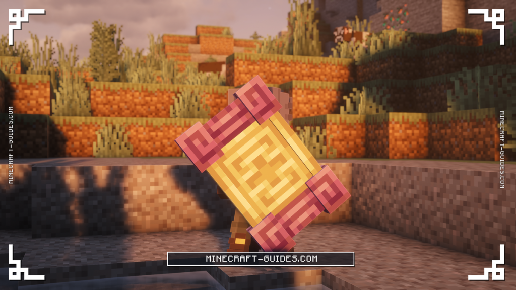 A player blocking with the Shulker Shield, a gold shield with a pink Purpur-style border and a cross pattern