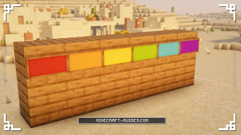 A wall of dyed Canvas Signs in red, orange, yellow, lime, light blue and purple