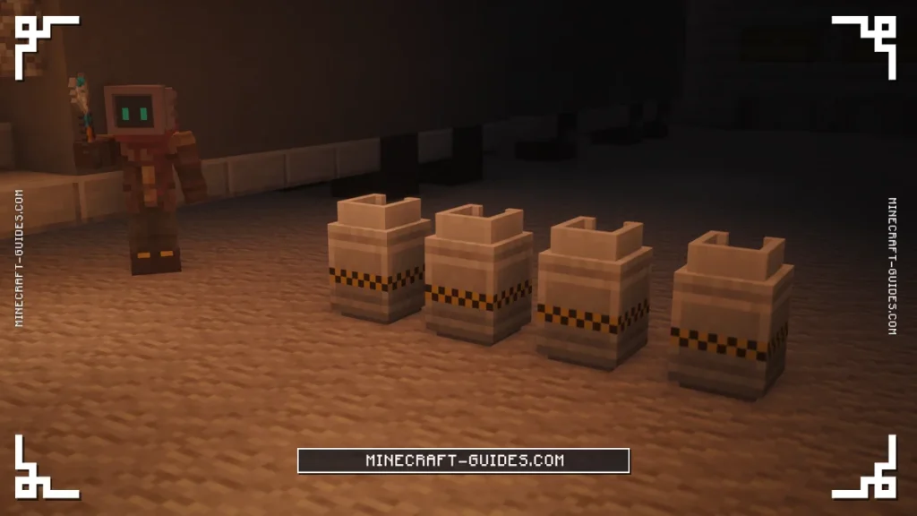 Ultimate, Elite, Advanced and Basic Chemical Tanks in a row inside a lantern-lit Mekanism hangar