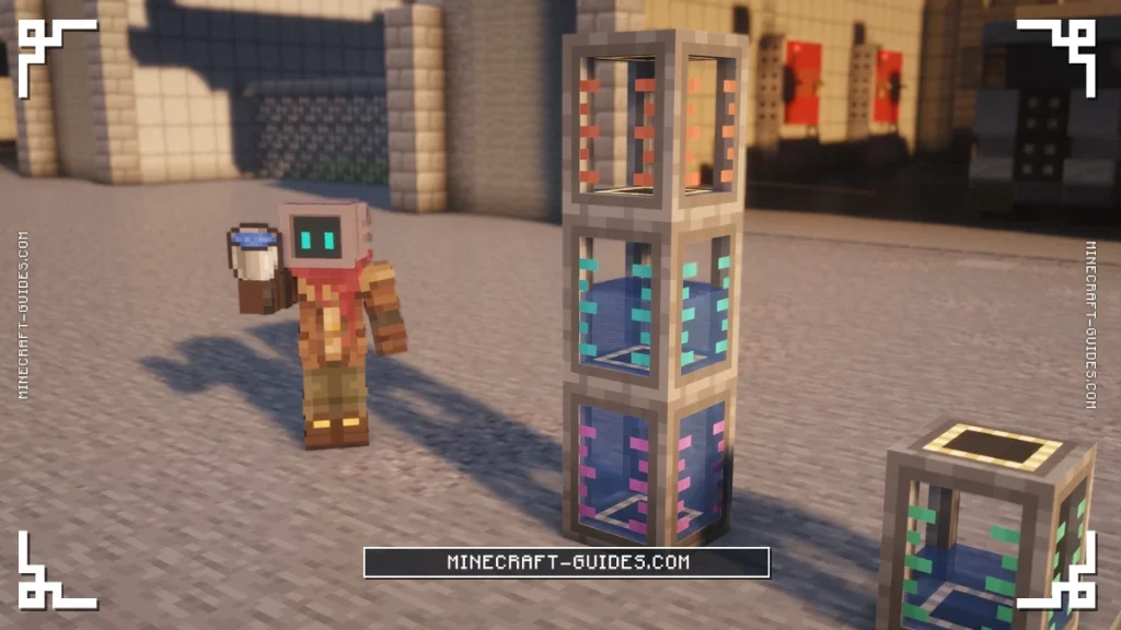 Ultimate, Elite and Advanced Fluid Tanks stacked full of Water beside a Basic Fluid Tank in Mekanism